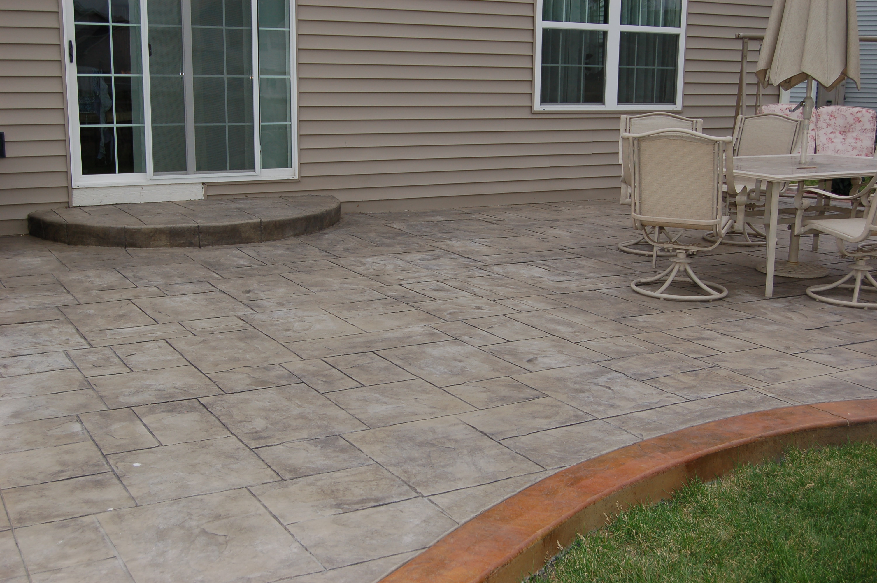 Stamped Concrete Patio - Upright Fences Downright Patios